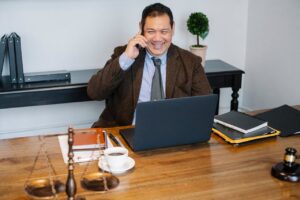 estate planning lawyer smiling on phone