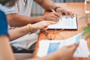 Person signing financial documents.