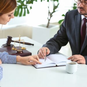 Attorney explaining legal documents to a client