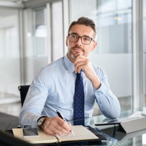 Man in office thinking